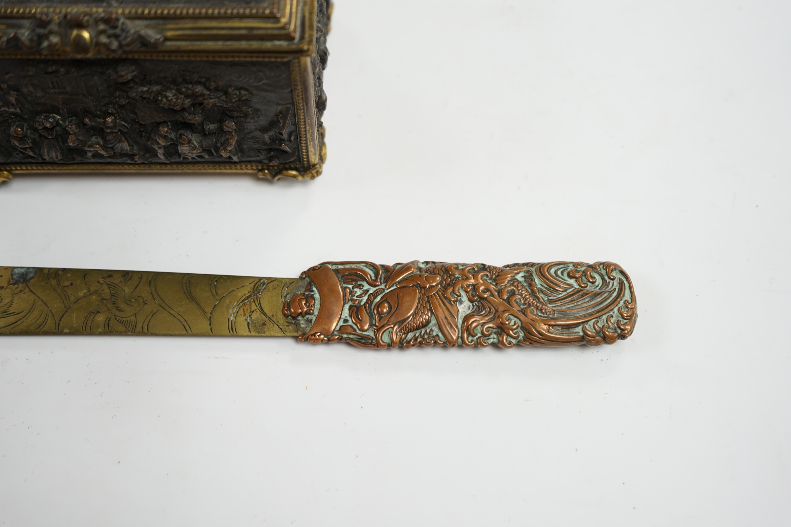 A Paris cast repousse figurative casket and a Japanese copper and brass paper knife, knife 30cm long. Condition - fair